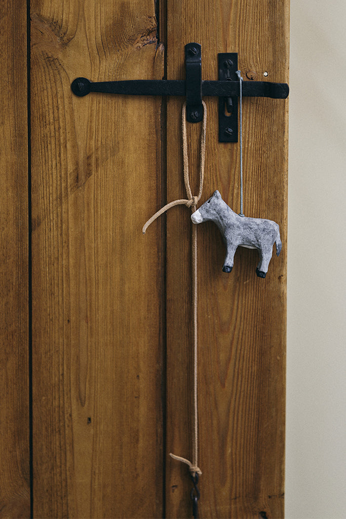 Donkey Ornament on door by Fog Linen at Abacus Row Handmade Jewelry