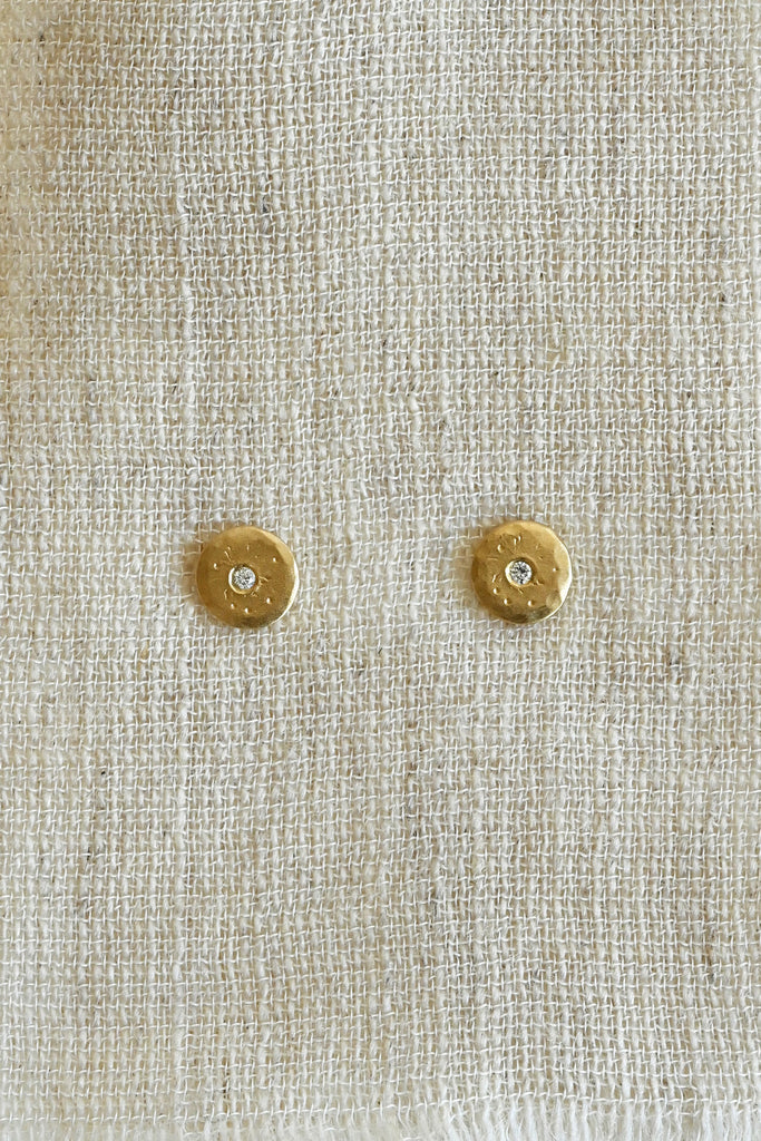 Mini Treasure Coin Diamond Stud Earrings close up by Sarah Swell at Abacus Row Handmade Jewelry